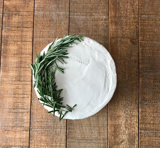Cake with rosemary accent designs
